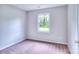 Neutral bedroom features soft carpet, one window with views, and fresh paint for a cozy feel at 817 32Nd Street Ne Dr, Conover, NC 28613