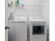 Laundry room with modern washer and dryer units at 8903 Ansley Park Pl, Huntersville, NC 28078