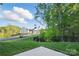 This yard features a view of the surrounding neighborhood at 8903 Ansley Park Pl, Huntersville, NC 28078