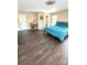 Large bedroom with dark wood floors, natural light and plenty of space at 9003 Brad Ct, Matthews, NC 28104