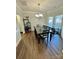 Elegant dining room with a large table and ample natural light at 9003 Brad Ct, Matthews, NC 28104