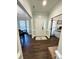 Open foyer with hardwood floors and access to living spaces at 9003 Brad Ct, Matthews, NC 28104