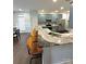 The kitchen has a large granite island with stainless steel appliances at 9003 Brad Ct, Matthews, NC 28104