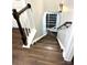 View of beautiful staircase with dark wood treads, white risers, and a dark wood railing at 9003 Brad Ct, Matthews, NC 28104