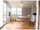 Dining area bathed in natural light with beautiful wood floors and traditional furnishings at 9216 Caycee Dr # 32, Davidson, NC 28036