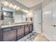 Large bathroom with double vanity, granite countertops and recessed lighting at 953 Kirby Dr, Fort Mill, SC 29715