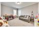 Bedroom with carpeted floors, neutral walls, and a window at 953 Kirby Dr, Fort Mill, SC 29715
