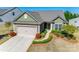 Single-story home with a well-kept lawn and an attached two-car garage at 953 Kirby Dr, Fort Mill, SC 29715