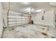 Spacious garage with high ceilings and ample room for parking and storage at 953 Kirby Dr, Fort Mill, SC 29715