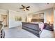 Bright main bedroom featuring neutral walls, ceiling fan, and plush gray carpet at 953 Kirby Dr, Fort Mill, SC 29715