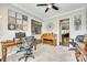 Open office area features a desk, piano, and easy access to other rooms at 953 Kirby Dr, Fort Mill, SC 29715