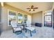 Comfortable screened-in porch with seating, perfect for enjoying the outdoors at 953 Kirby Dr, Fort Mill, SC 29715