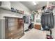 Walk-in closet with lots of shelving for clothes, luggage, and shoes at 953 Kirby Dr, Fort Mill, SC 29715