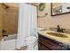 This bathroom features a tiled shower and tub combination as well as a modern vanity at 101 Grier St, York, SC 29745
