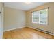 With hardwood floors and a window for natural light, this bedroom is ready for your personal touches at 101 Grier St, York, SC 29745