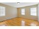 Spacious bedroom featuring hardwood floors and a light and airy feel at 101 Grier St, York, SC 29745