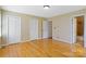 This bedroom has gleaming hardwood floors, and ample storage is provided with the double closets at 101 Grier St, York, SC 29745