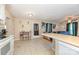 This open-concept kitchen features tiled floors, modern cabinetry and a breakfast bar, perfect for entertaining and Gathering meals at 1131 Laurel St, Salisbury, NC 28144