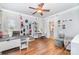 Large bonus room featuring hardwood floors, desk and vanity area at 114 Misty Meadows Ct, Mooresville, NC 28117