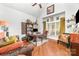 Spacious office with hardwood floors, built-in bookshelves, and lots of natural light at 114 Misty Meadows Ct, Mooresville, NC 28117
