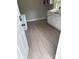 The laundry room area features new flooring and storage at 116 Morning Glory Ave, Belmont, NC 28012