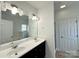 Bright bathroom features a double sink vanity, large mirror, and separate shower and toilet areas for added convenience at 12421 Fiorentina St, Charlotte, NC 28277