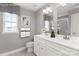 Elegant bathroom featuring a double vanity, framed mirror, and a separate shower at 1358 Holden Sw Ave, Concord, NC 28025