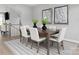 Formal dining room with a wood table, upholstered chairs, and neutral decor at 1358 Holden Sw Ave, Concord, NC 28025