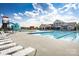 Community pool, featuring several lounge chairs and a water slide, providing plenty of amenities at 1358 Holden Sw Ave, Concord, NC 28025