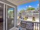 Outdoor seating with scenic views of the neighborhood from the private balcony at 138 Marron Dr # 25, Indian Trail, NC 28079