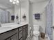 Bathroom with double vanity, providing ample space, and a shower with patterned curtain at 138 Marron Dr # 25, Indian Trail, NC 28079