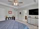 Spacious bedroom featuring soft carpet, a tray ceiling, and a doorway to the en-suite bathroom at 138 Marron Dr # 25, Indian Trail, NC 28079