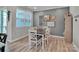 Cozy dining area featuring a modern table set near a bright window at 138 Marron Dr # 25, Indian Trail, NC 28079