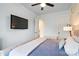 Bedroom with comfortable bed, accent lighting, and built-in storage at 140 Sisters Cove Ct, Mooresville, NC 28117