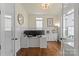 Cozy home office with a work desk and decorative white cabinets at 140 Sisters Cove Ct, Mooresville, NC 28117