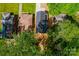 Aerial view of a home nestled among lush green trees, showcasing its backyard at 1413 Hateras Ave, Charlotte, NC 28216