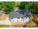 Aerial view of the house showing the backyard, deck, and surrounding neighborhood at 1413 Hateras Ave, Charlotte, NC 28216