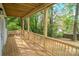 Expansive back deck offers a relaxing outdoor space with views of mature trees at 1413 Hateras Ave, Charlotte, NC 28216