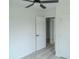 The bright bedroom has 2 closets and a door to another bedroom at 1413 Hateras Ave, Charlotte, NC 28216