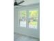 A bedroom with natural light and views of the yard at 1413 Hateras Ave, Charlotte, NC 28216