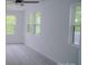 This airy bedroom has plenty of natural light and lots of open space at 1413 Hateras Ave, Charlotte, NC 28216
