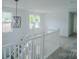 A hallway featuring modern fixtures and ample space at 1413 Hateras Ave, Charlotte, NC 28216