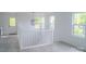 A light and bright hallway featuring modern fixtures and ample space at 1413 Hateras Ave, Charlotte, NC 28216