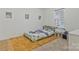 Bedroom with a bed, area rug, a large window, and decor to personalize the space at 14224 Canemeadow Dr, Charlotte, NC 28278