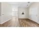 Living Room featuring wood flooring, neutral walls, and access to kitchen and other rooms at 1682 Sandpiper Dr, Rock Hill, SC 29732