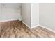 Spacious room with wood floors, neutral paint, and ample natural light creating a versatile and inviting space at 1682 Sandpiper Dr, Rock Hill, SC 29732
