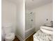 Bathroom featuring granite countertops, dual sinks, and tub at 171 Three Cs Rd, Kershaw, SC 29067