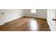 Cozy bedroom with wood floors and a window, offering a comfortable and inviting space at 171 Three Cs Rd, Kershaw, SC 29067