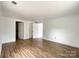 Bedroom with wood-look flooring and multiple doors at 171 Three Cs Rd, Kershaw, SC 29067