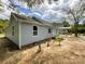 Exterior view with stepping stones to front door at 171 Three Cs Rd, Kershaw, SC 29067